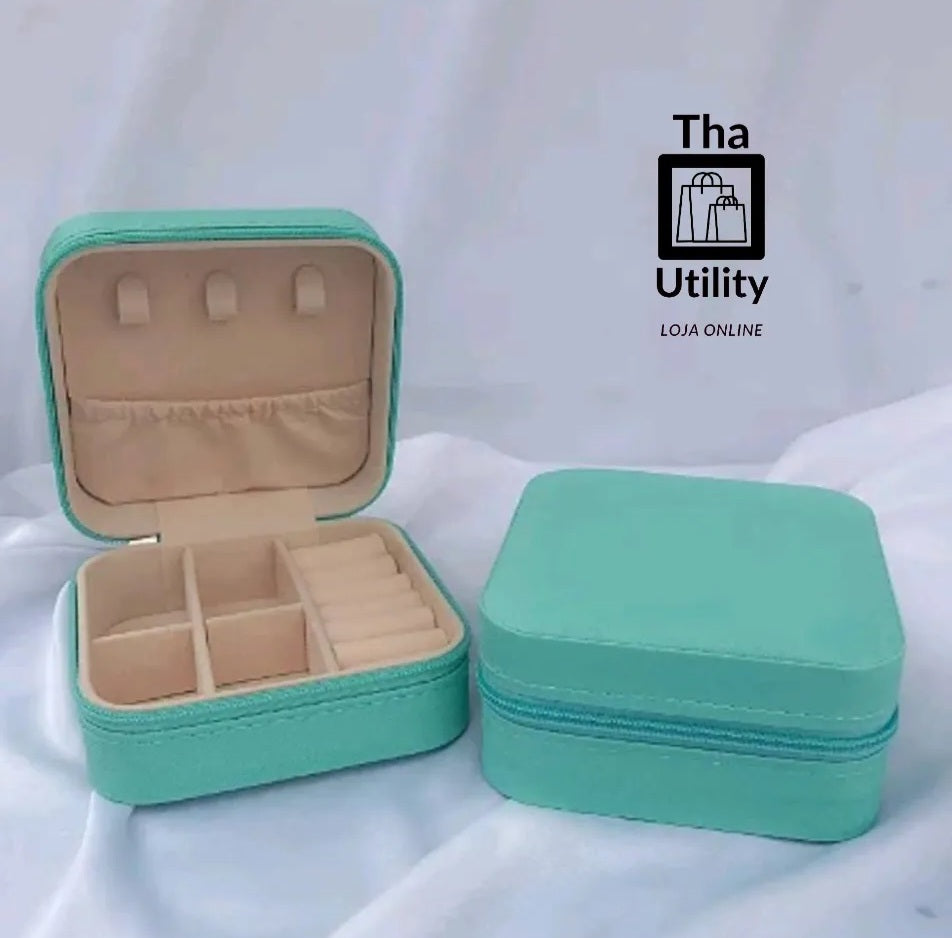 "Brilhe em Qualquer Lugar: Mini Porta-Joias Portátil - Suas Joias Sempre à Mão com Elegância!"